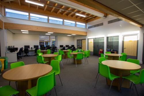 Inside the new study centre showing tables and chairs