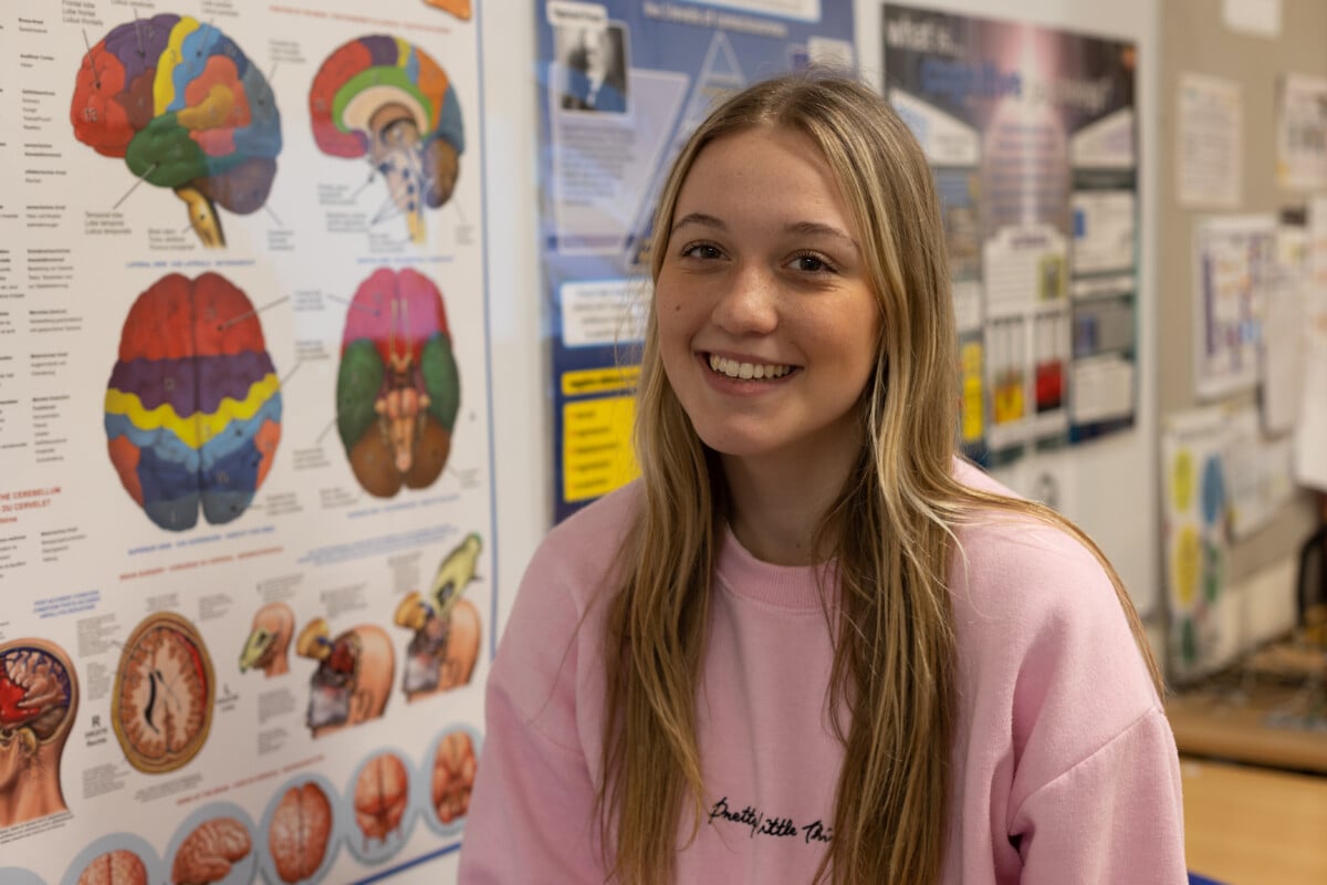 Connie with poster of brain