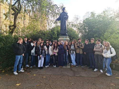 Group Shot With Statue